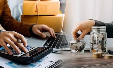 young-woman-small-business-owner-online-shopping-home-taking-note-orders-from-cu